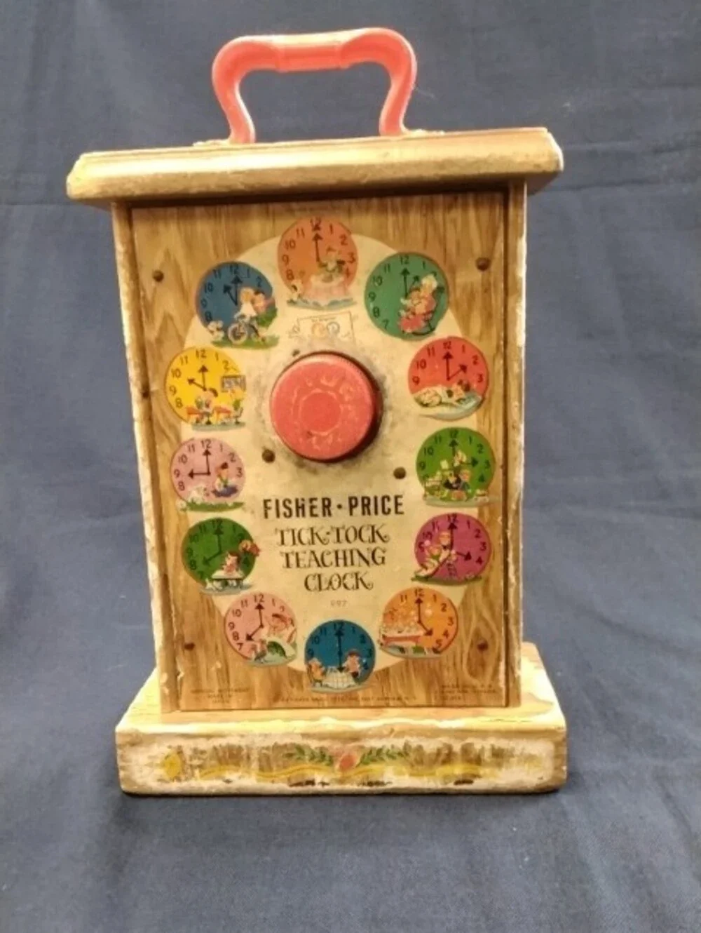 Fisher-Price Wooden Toy Clock with Pink Handle and Red/Pink Hands